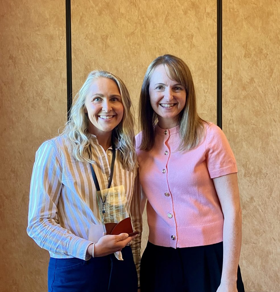 Dana Boler, the Health Director at La Crosse Area Family YMCA accepting the 2025 Collaboration Award on behalf of La Crosse Area Family YMCA and Emplify Health Culinary Medicine